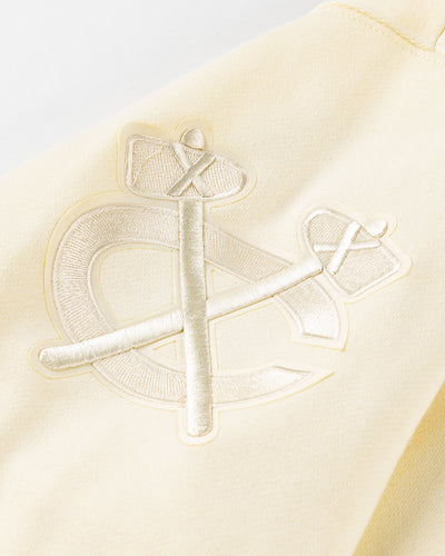 eggshell Pro Standard hoodie with embroidered tonal patches on front, shoulders and hood - alt shoulder lay flat