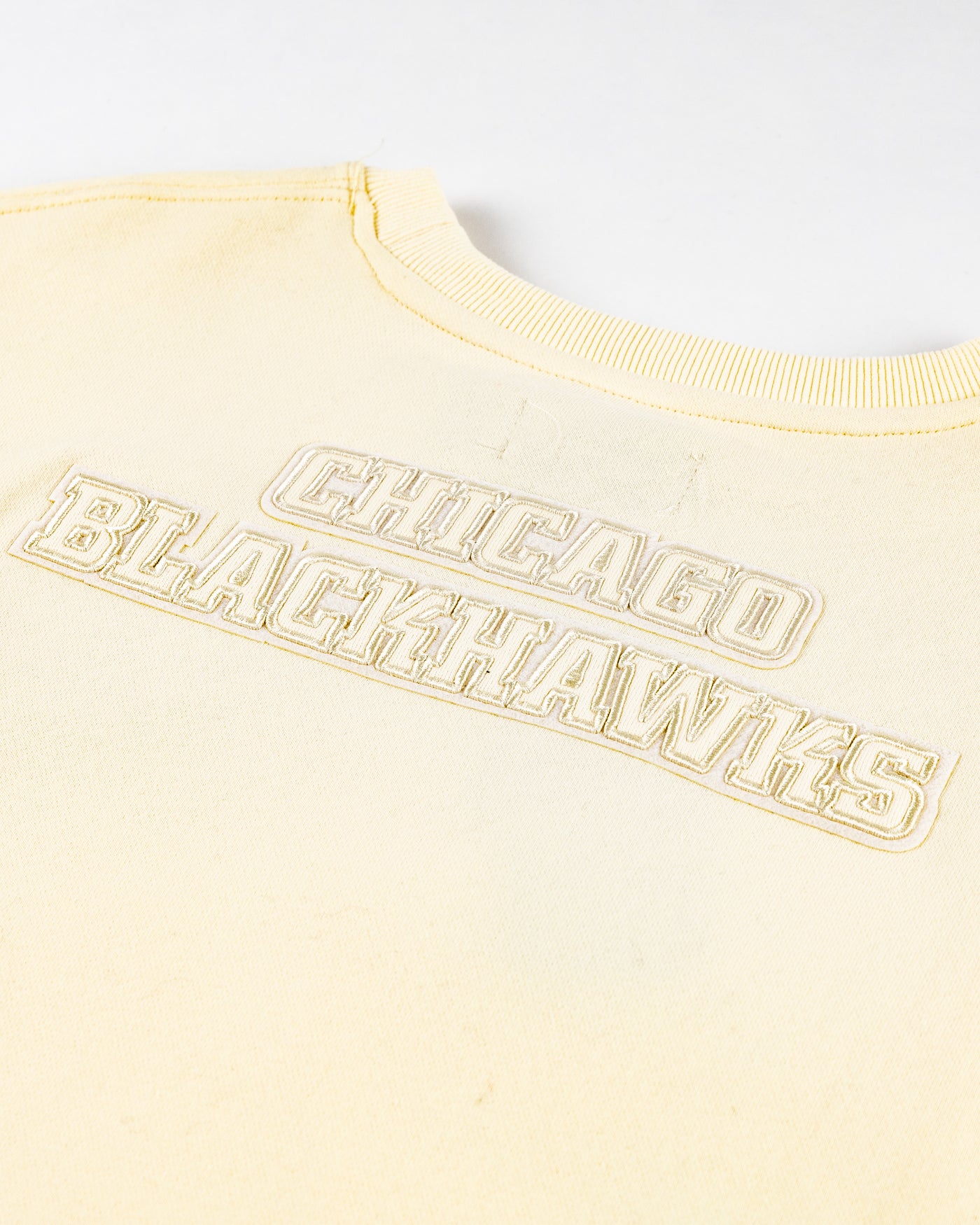 eggshell cropped crewneck with Chicago Blackhawks patches embroidered on left chest, right shoulder and back yoke - detail back lay flat