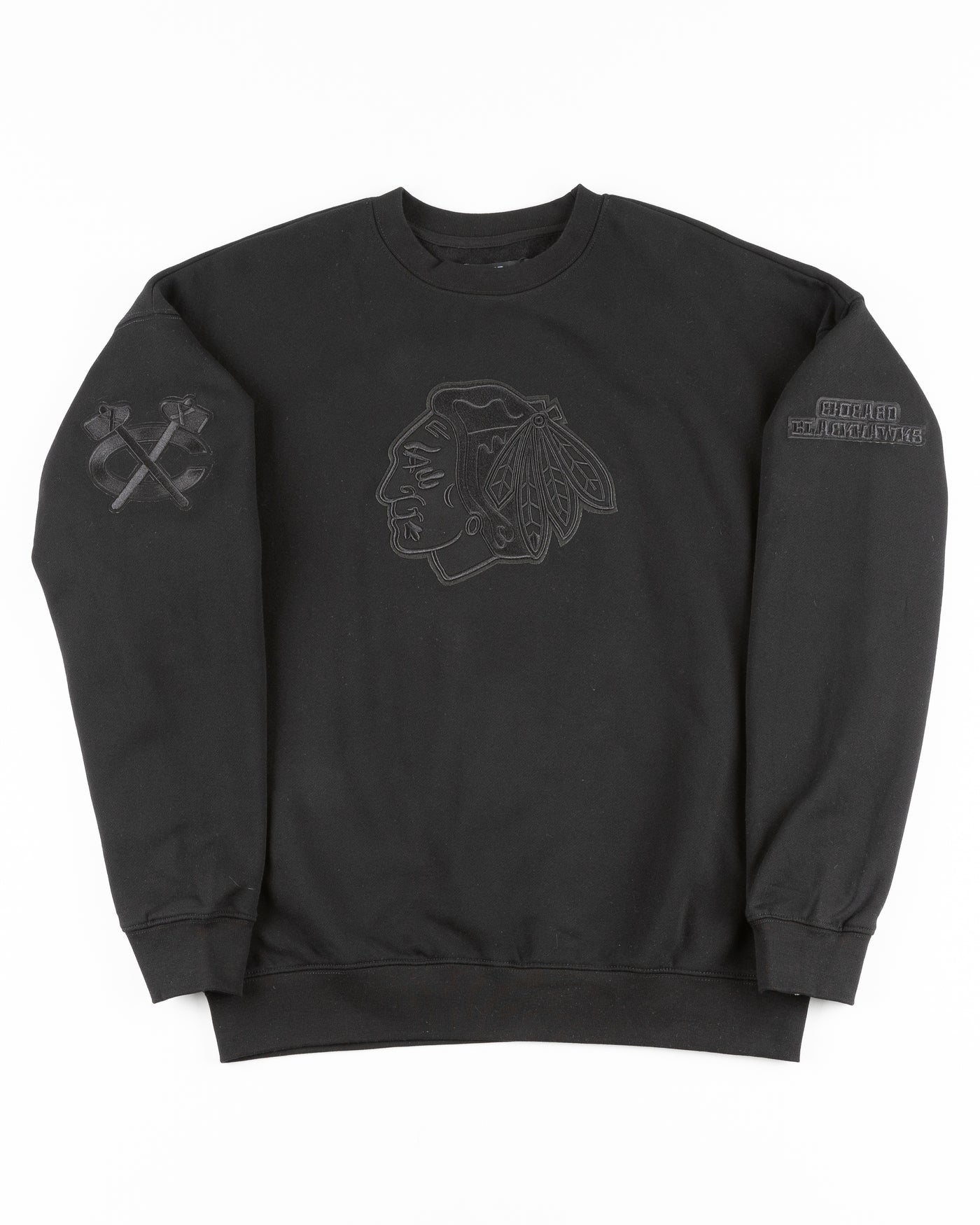 all black crewneck with tonal Chicago Blackhawks patches embroidered on front and shoulders - front lay flat