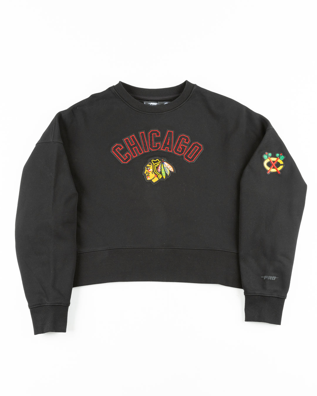 black cropped Pro Standard crewneck with embroidered Chicago Blackhawks patches on chest and shoulder - front lay flat