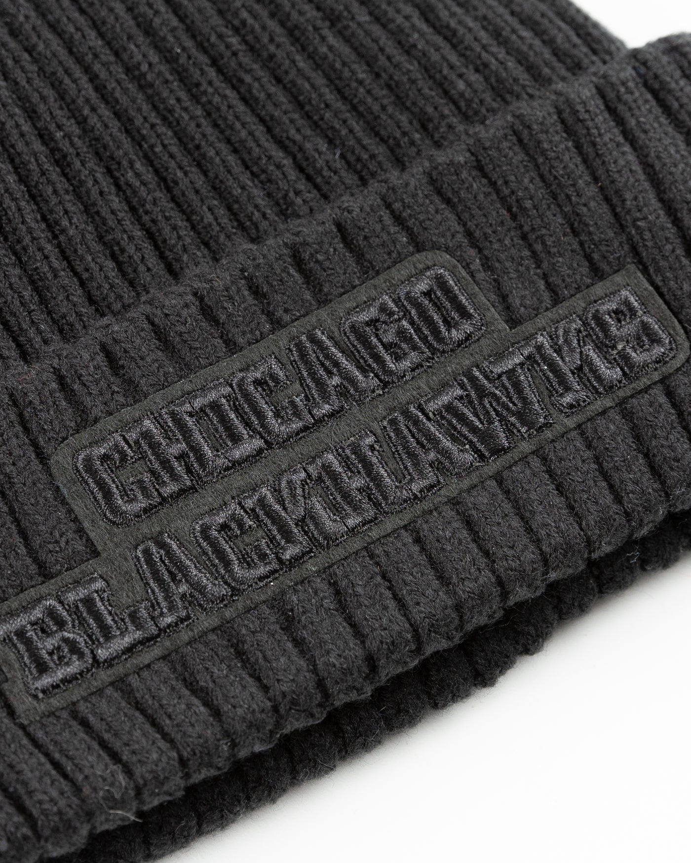 eggshell Pro Standard knit beanie with tonal embroidered Chicago Blackhawks primary logo on front and embroidered tonal wordmark on back - back detail lay flat
