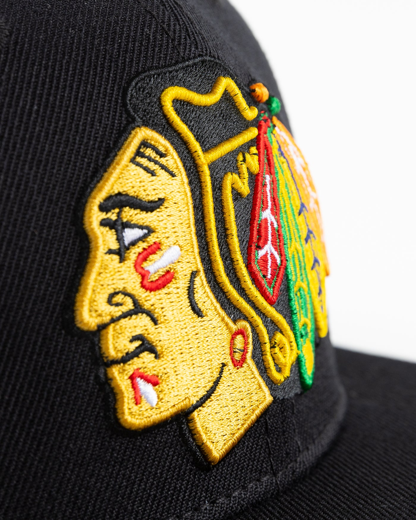 black Pro Standard wool snapback with Chicago Blackhawks embroidered logos on front, side and back - front detail lay flat