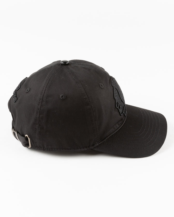 all black adjustable cap with tonal Chicago Blackhawks primary logo embroidered on front - right side lay flat 