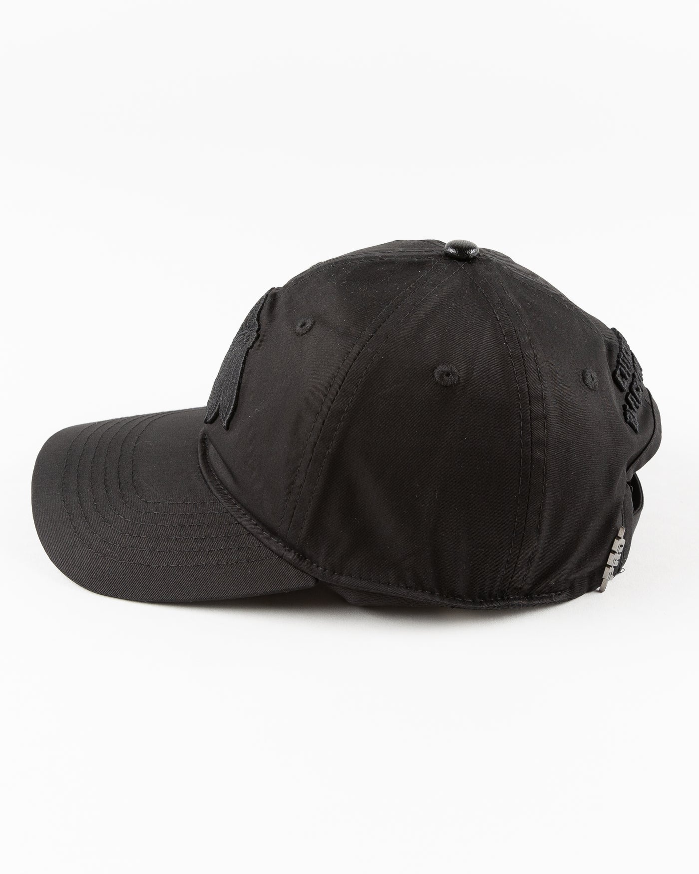 all black adjustable cap with tonal Chicago Blackhawks primary logo embroidered on front - left side lay flat 