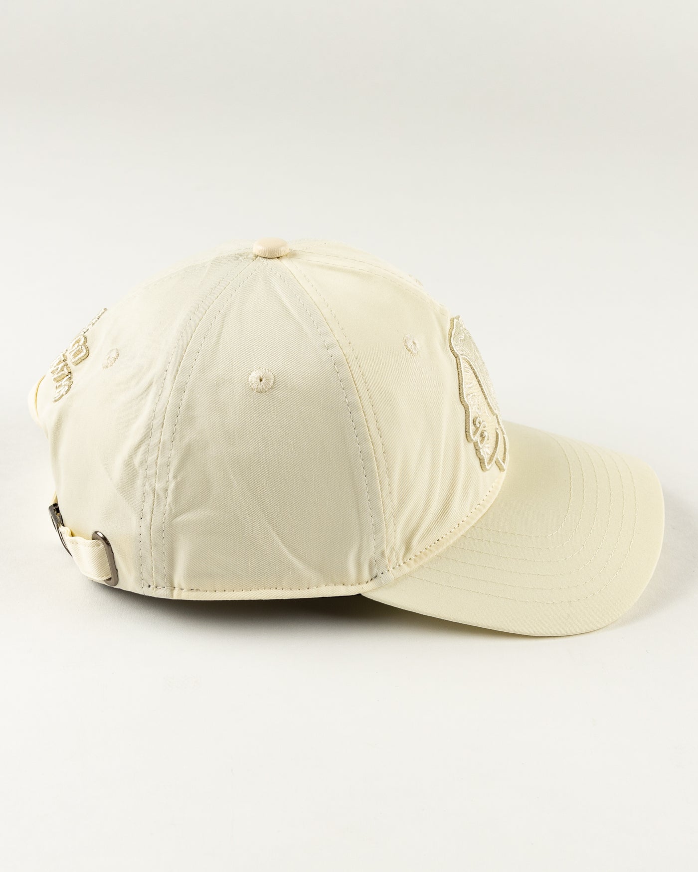 all eggshell adjustable cap with tonal Chicago Blackhawks primary logo embroidered on front - right side lay flat 