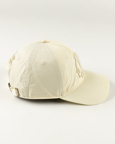 all eggshell adjustable cap with tonal Chicago Blackhawks primary logo embroidered on front - right side lay flat 