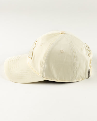 all eggshell adjustable cap with tonal Chicago Blackhawks primary logo embroidered on front - left side lay flat 