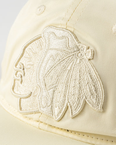 all eggshell adjustable cap with tonal Chicago Blackhawks primary logo embroidered on front - detail lay flat 