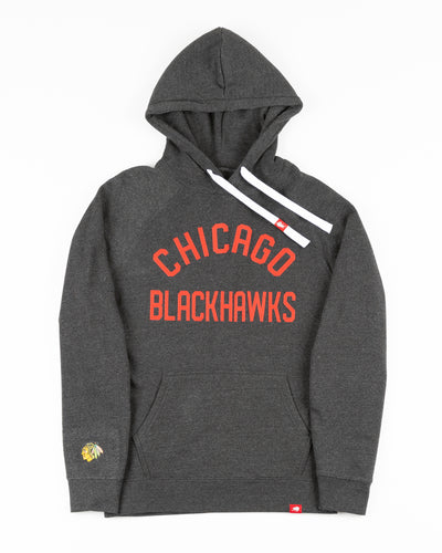 black Sportiqe hoodie with Chicago Blackhawks wordmark embroidered on front - front lay flat