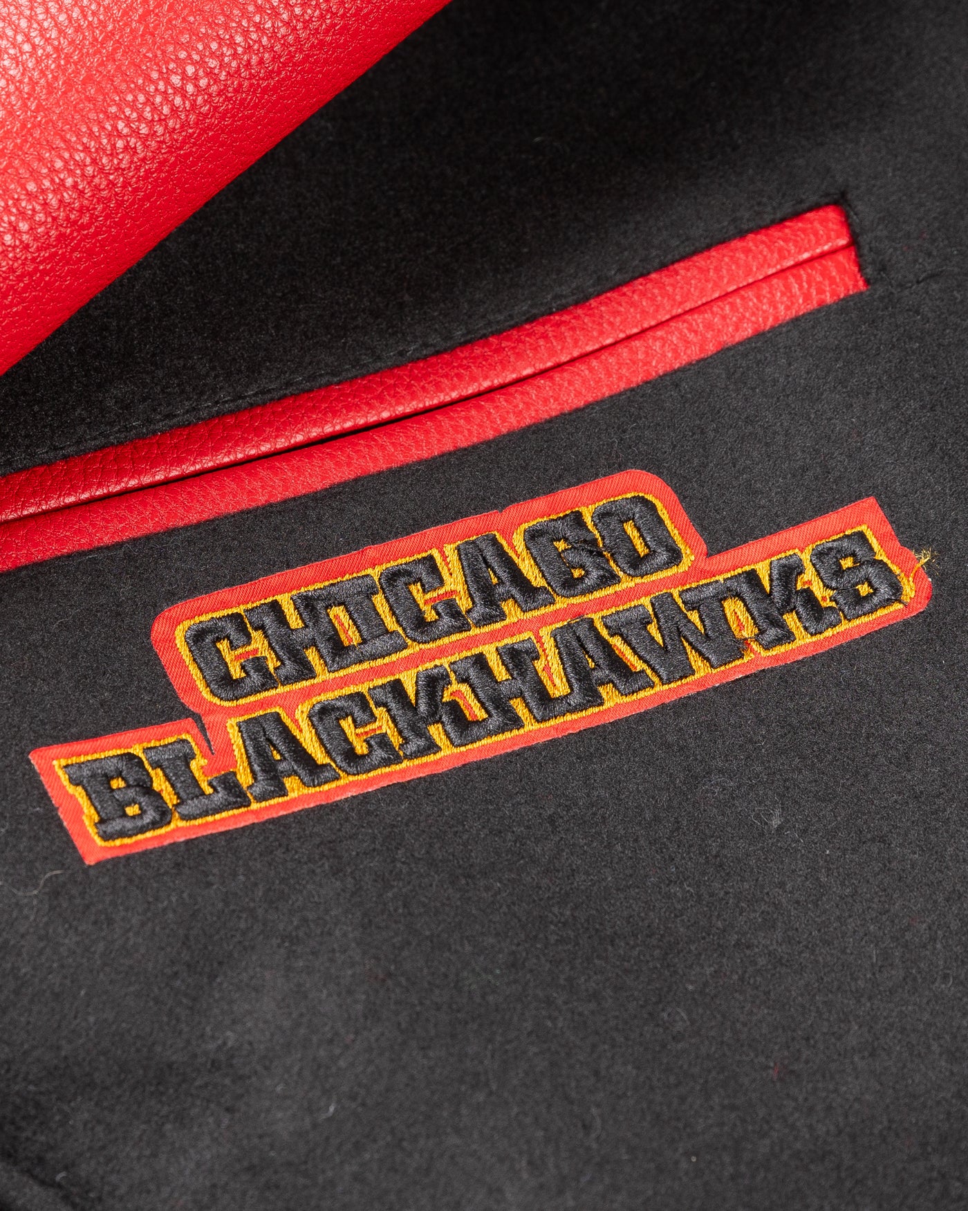 black and red wool varsity Pro Standard jacket with Chicago Blackhawks patches - pocket detail lay flat