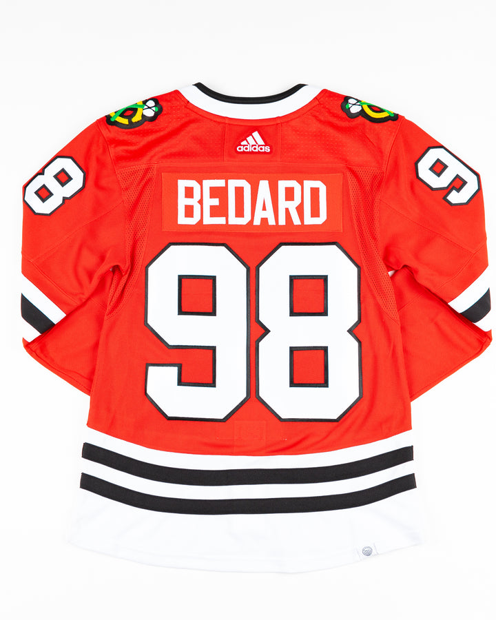 adidas red home Chicago Blackhawks hockey jersey with Connor Bedard name and number - back lay flat