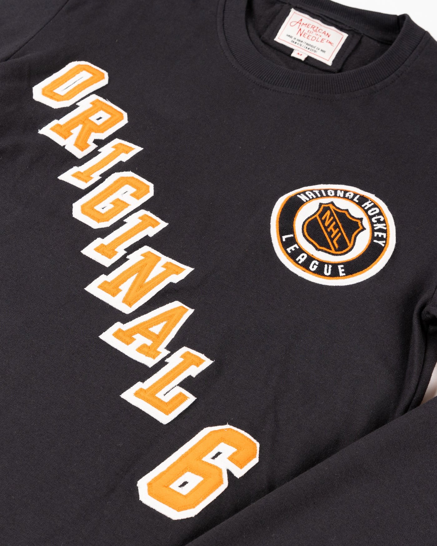 black American Needle long sleeve heavyweight cotton tee with Original Six details across front - detail front lay flat