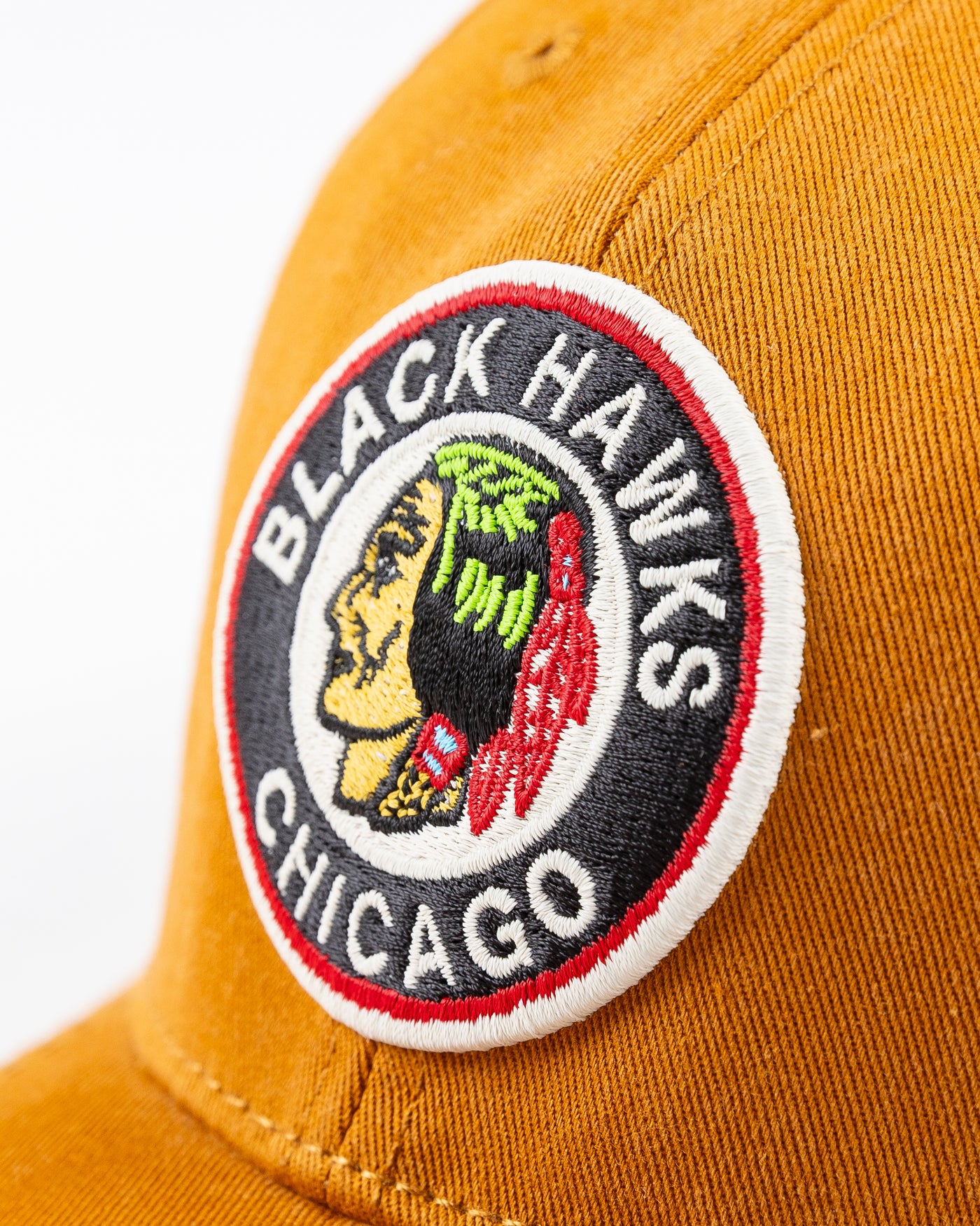 brown American Needle snapback cap with vintage Chicago Blackhawks logo embroidered on front - detail front lay flat