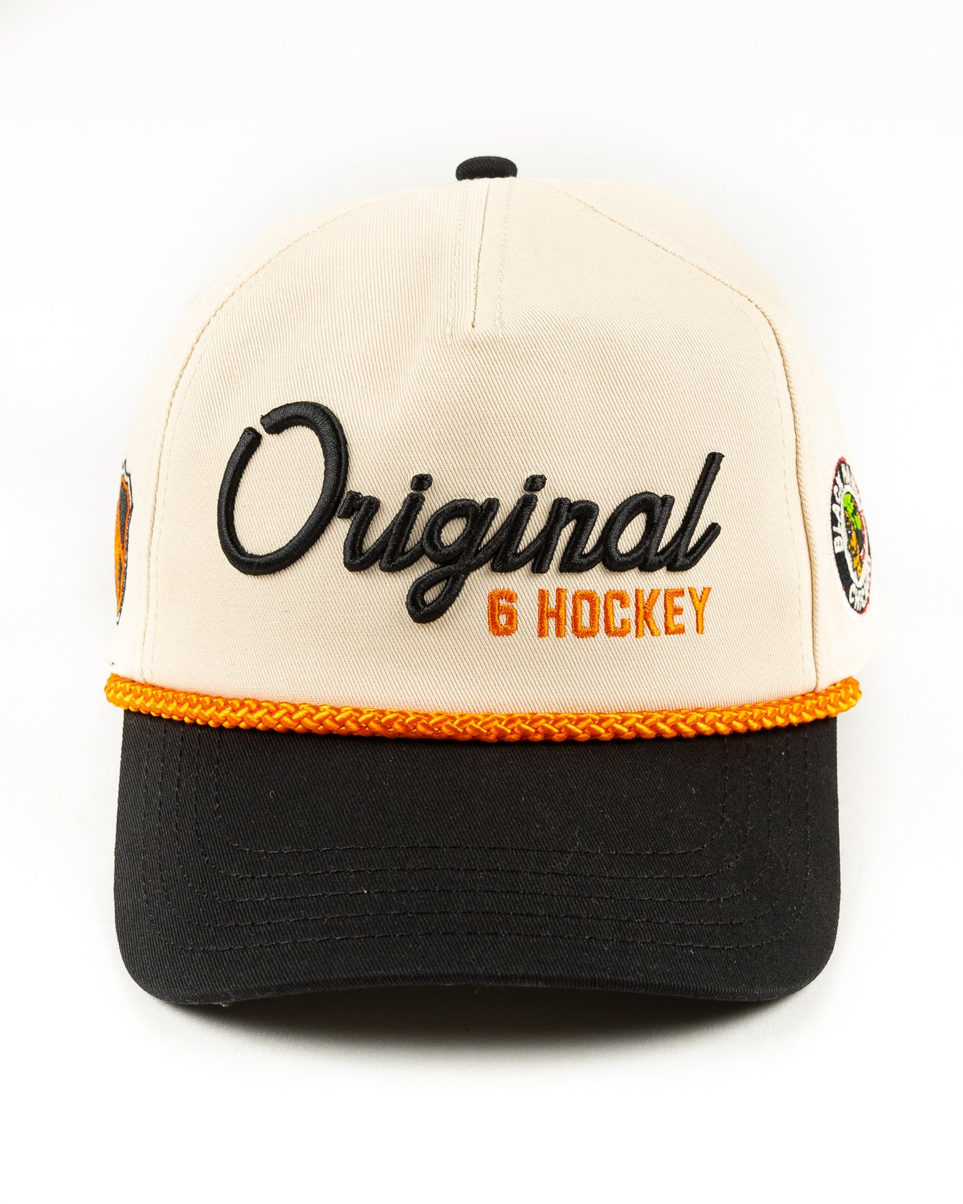 beige, black and orange snapback rope hat with Original Six hockey word graphic across front and vintage Chicago Blackhawks logo embroidered on left side - front lay flat