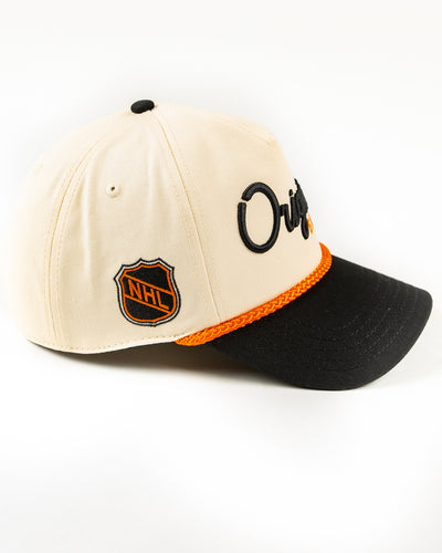 beige, black and orange snapback rope hat with Original Six hockey word graphic across front and vintage Chicago Blackhawks logo embroidered on left side - right side lay flat