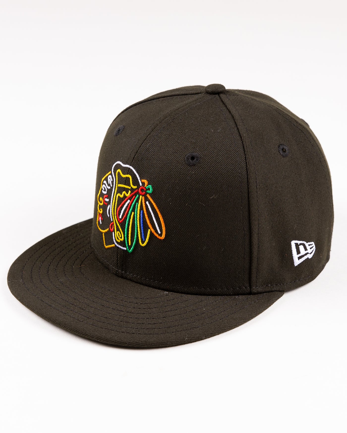 black New Era fitted cap with Chicago Blackhaks primary logo embroidered in front and secondary logo embroidered on back in neon lights colorway - left angle lay flat