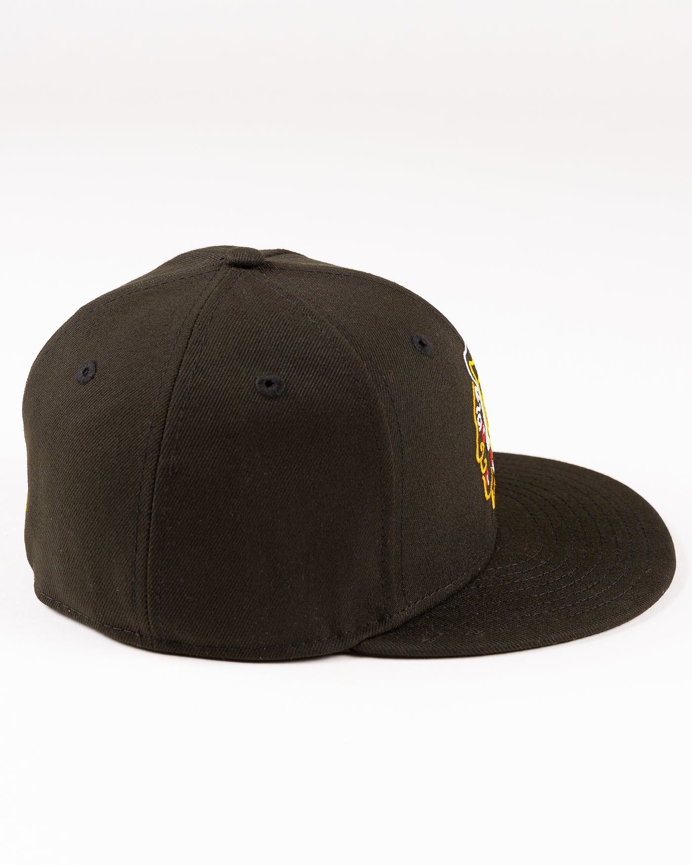 black New Era fitted cap with Chicago Blackhaks primary logo embroidered in front and secondary logo embroidered on back in neon lights colorway - right side lay flat