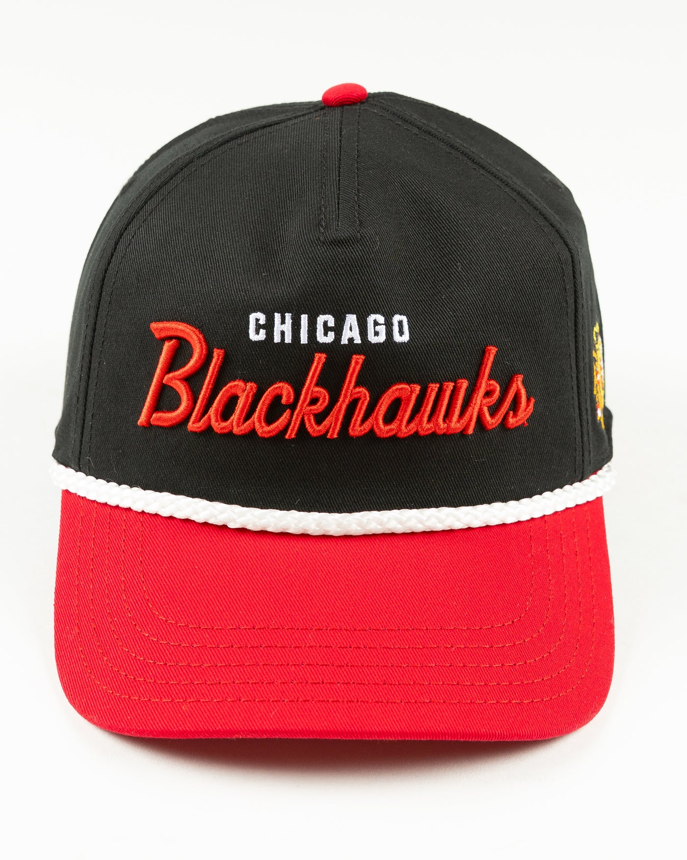 black and red rope snapback with Chicago Blackhawks wordmark across front and primary logo on left side - front lay flat