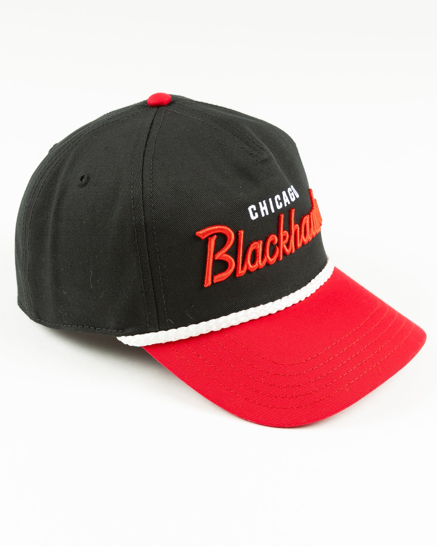 black and red rope snapback with Chicago Blackhawks wordmark across front and primary logo on left side - right angle lay flat