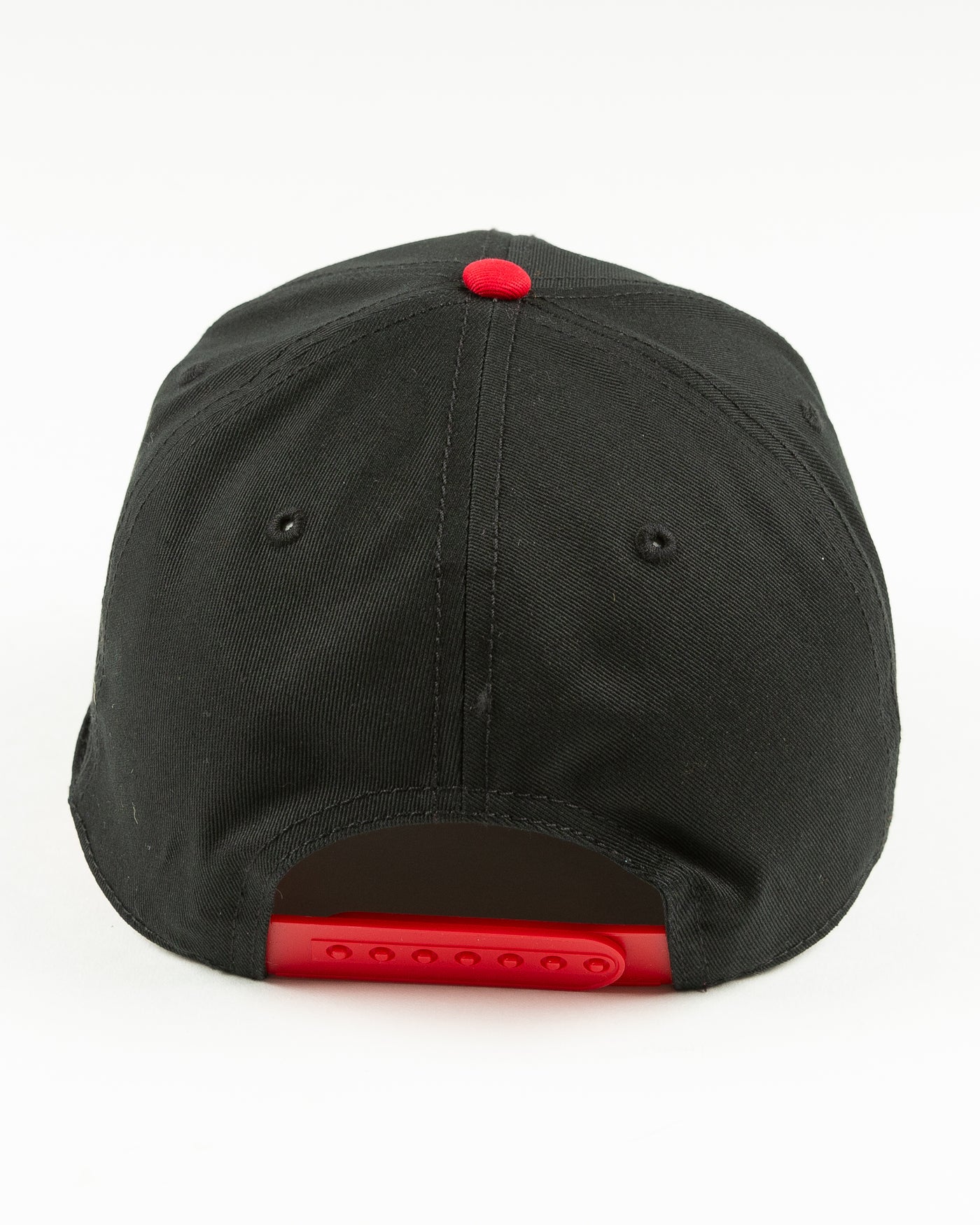 black and red rope snapback with Chicago Blackhawks wordmark across front and primary logo on left side - back lay flat