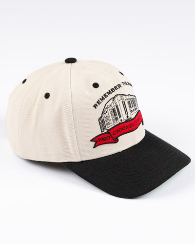 beige Mitchell & Ness snapback cap with Chicago Stadium embroidered design and Chicago Blackhawks primary logo on left side - right angle lay flat