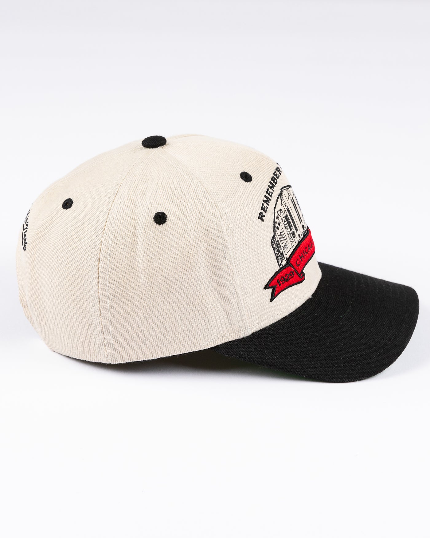 beige Mitchell & Ness snapback cap with Chicago Stadium embroidered design and Chicago Blackhawks primary logo on left side - right side lay flat