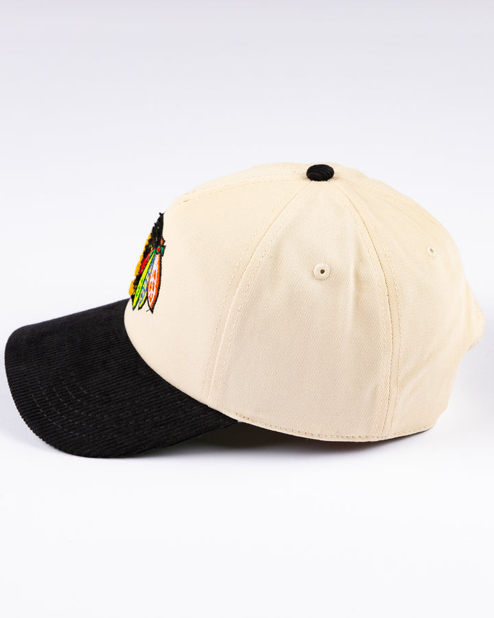 American Needle two tone snapback with chenile primary logo - left side lay flat