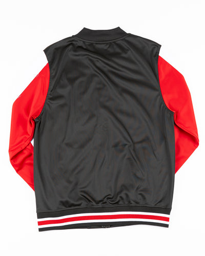 black red and white New Era track jacket with Chicago Blackhawks patches on front - back lay flat
