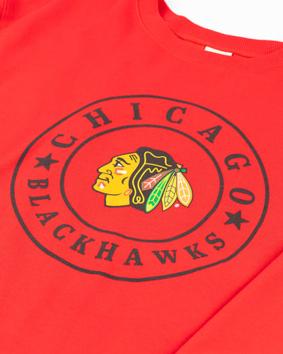 red ladies chicka-d crewneck with Chicago Blackhawks wordmark and primary logo in a circular design - detail lay flat