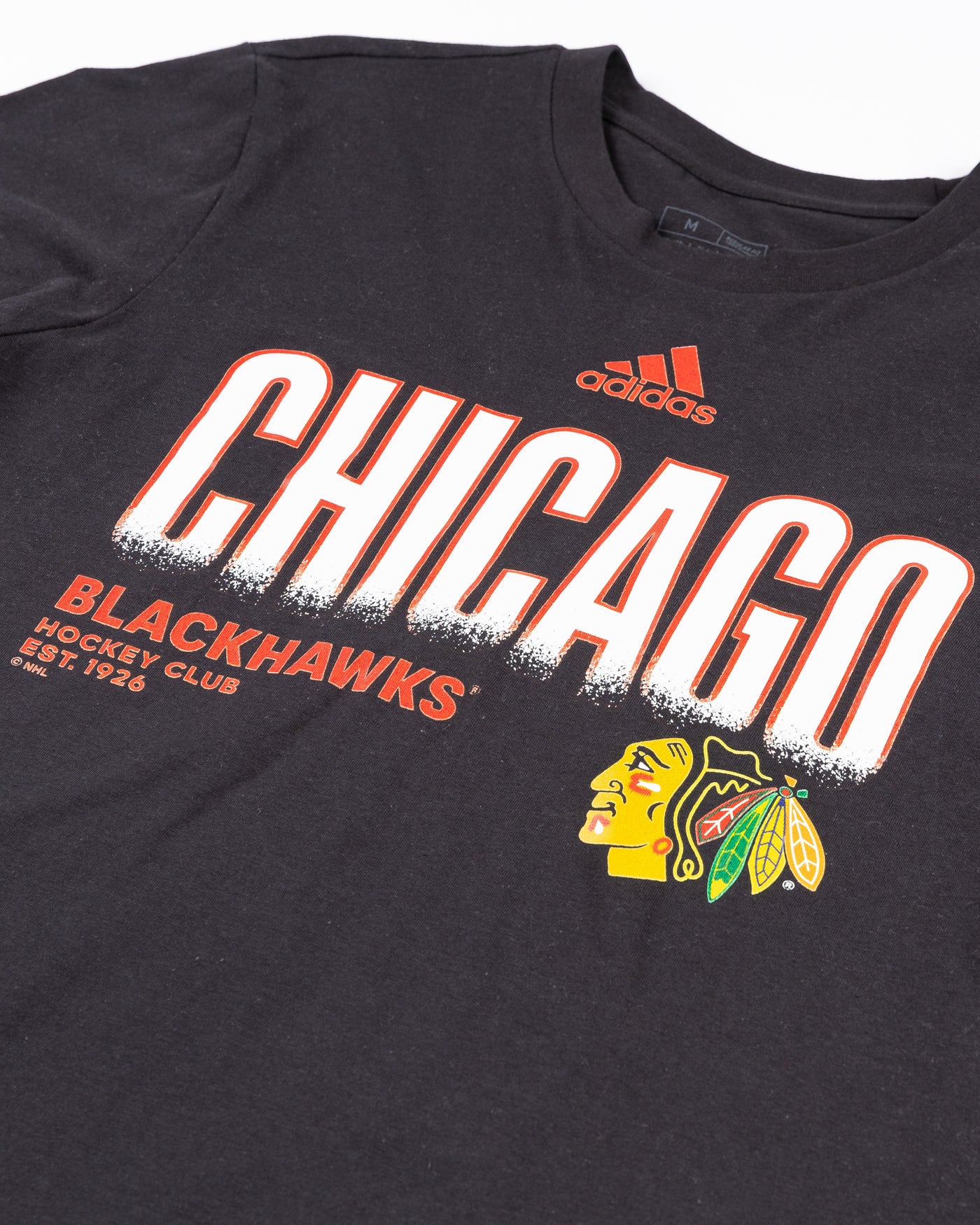 black adidas short sleeve tee with Chicago Blackhawks primary logo - detail lay flat
