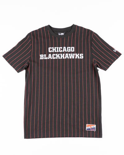 black New Era tee with red pinstripes and Chicago Blackhawks wordmark embroidered on front and primary logo printed on back - front lay flat