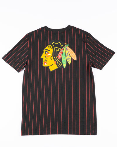 black New Era tee with red pinstripes and Chicago Blackhawks wordmark embroidered on front and primary logo printed on back - back lay flat