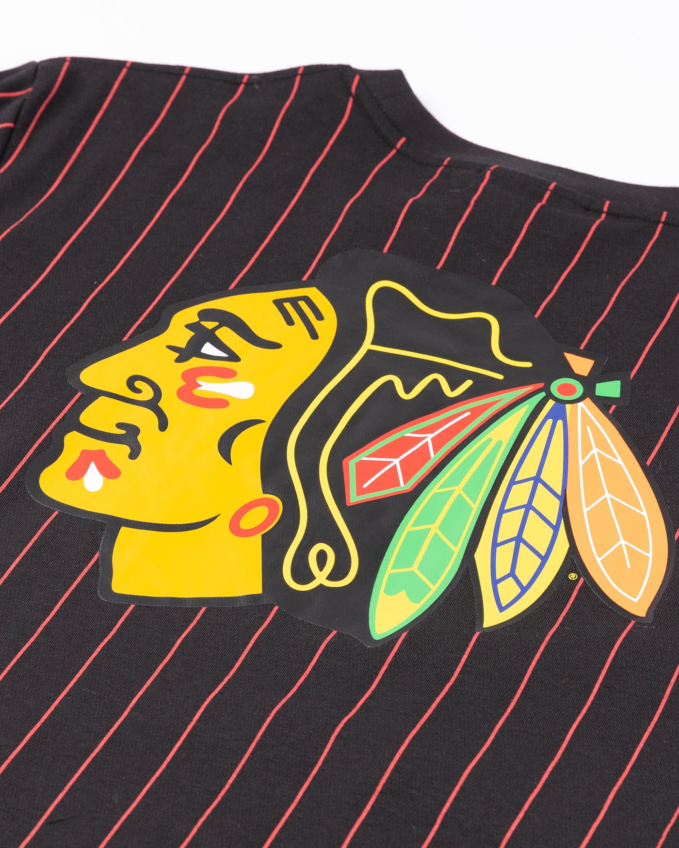black New Era tee with red pinstripes and Chicago Blackhawks wordmark embroidered on front and primary logo printed on back - back detail lay flat