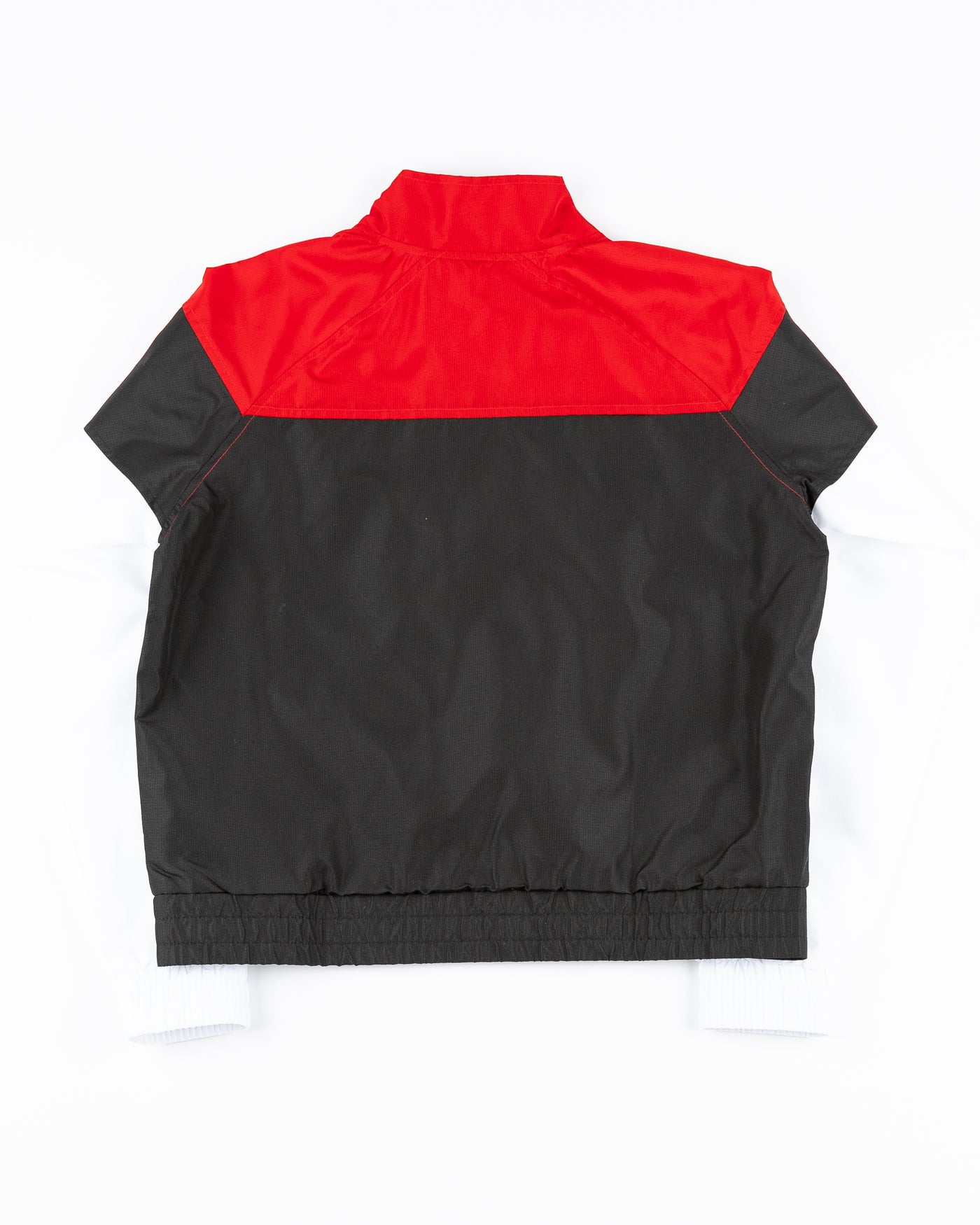 color block New Era ladies zip up track jacket with Chicago Blackhawks primary logo and wordmark on left arm - back lay flat