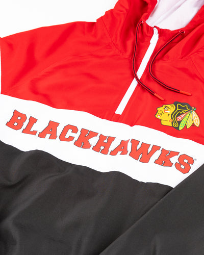 black red and white New Era hooded windbreaker jacket with Chicago Blackhawks wordmark and primary logo - detail lay flat
