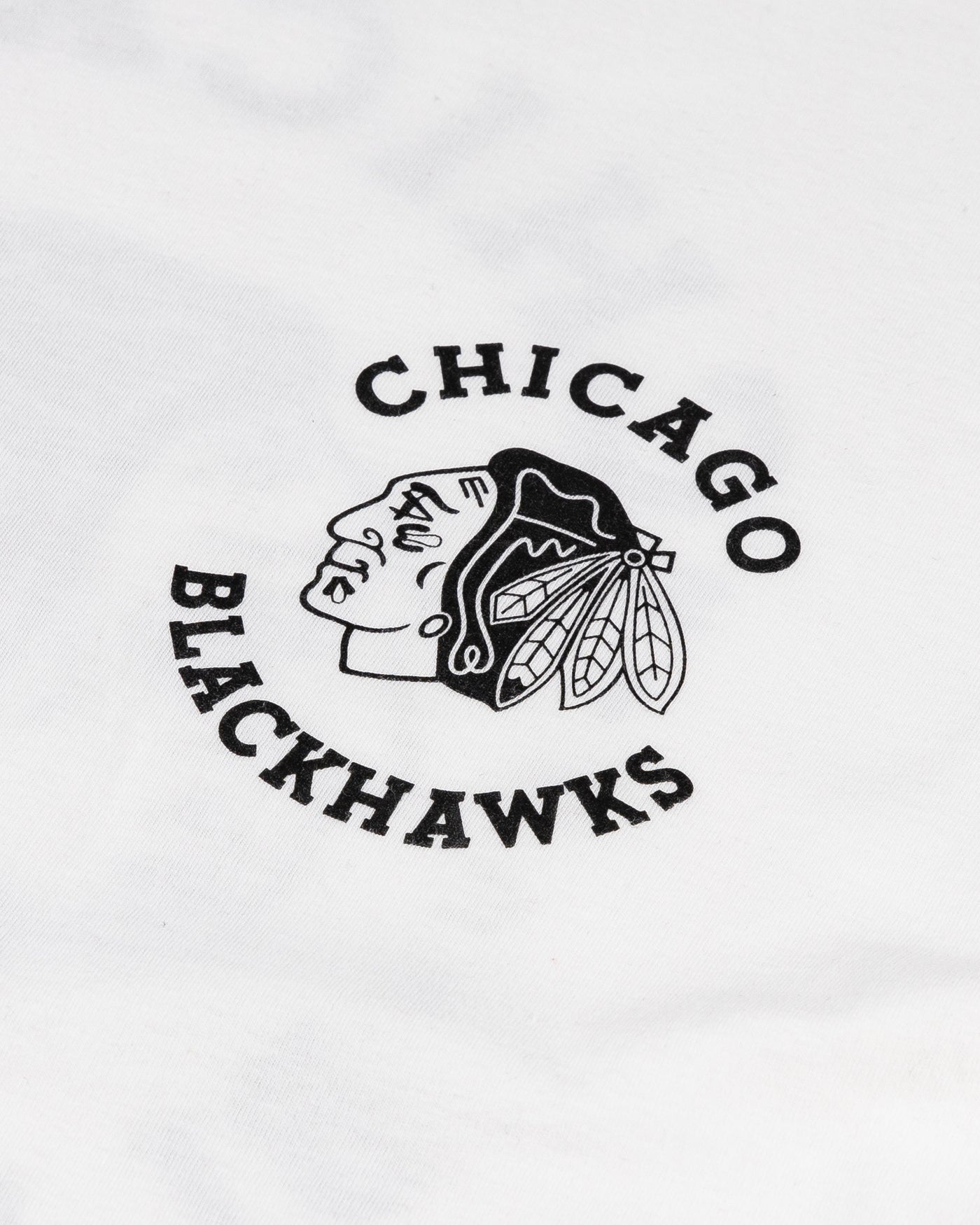 white '47 brand long sleeve tee with Chicago Blackhawks graphic on front left chest and back - front detail lay flat