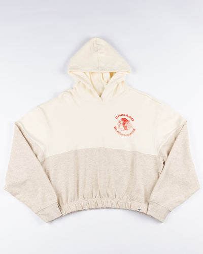 two tone oatmeal cropped ladies hoodie from '47 brand with Chicago Blackhawks logo on left chest - front lay flat