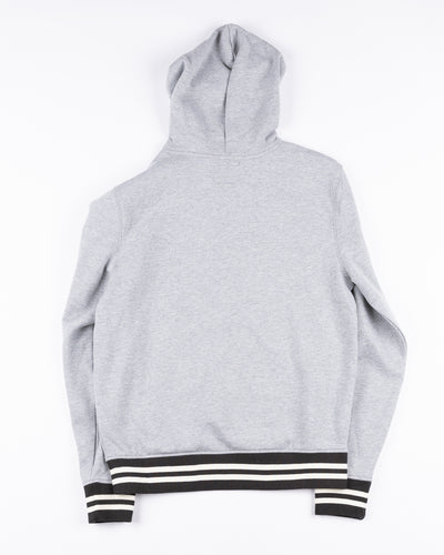 grey '47 brand hoodie with Chicago Blackhawks wordmark across chest and secondary logo on left shoulder - back lay flat