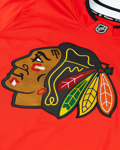 red Fanatics replica Chicago Blackhawks jersey with Connor Bedard name and number - detail lay flat