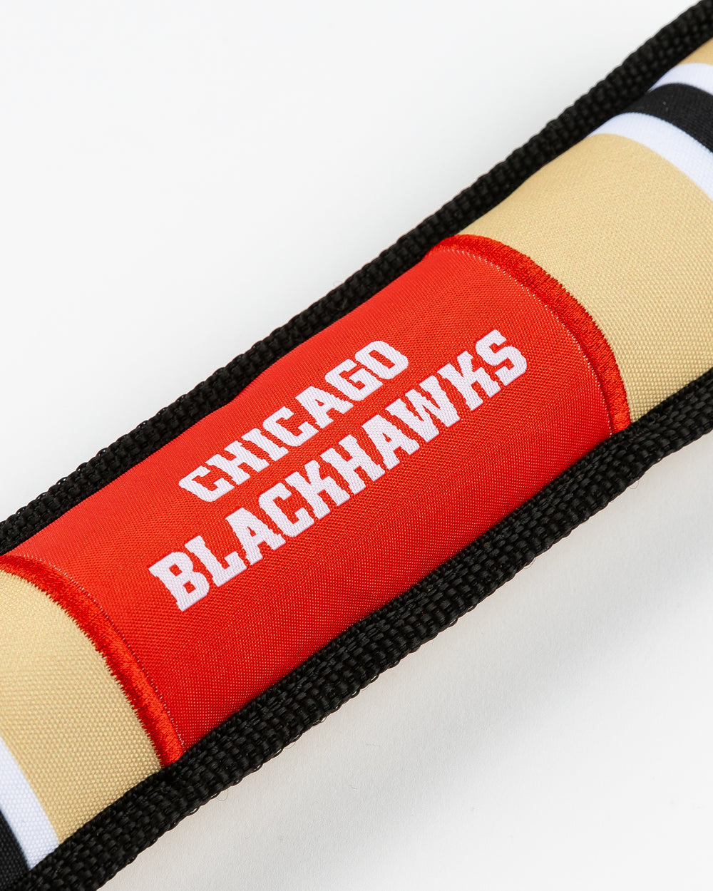 Chicago Blackhawks dog toy in shape of hockey stick - detail lay flat
