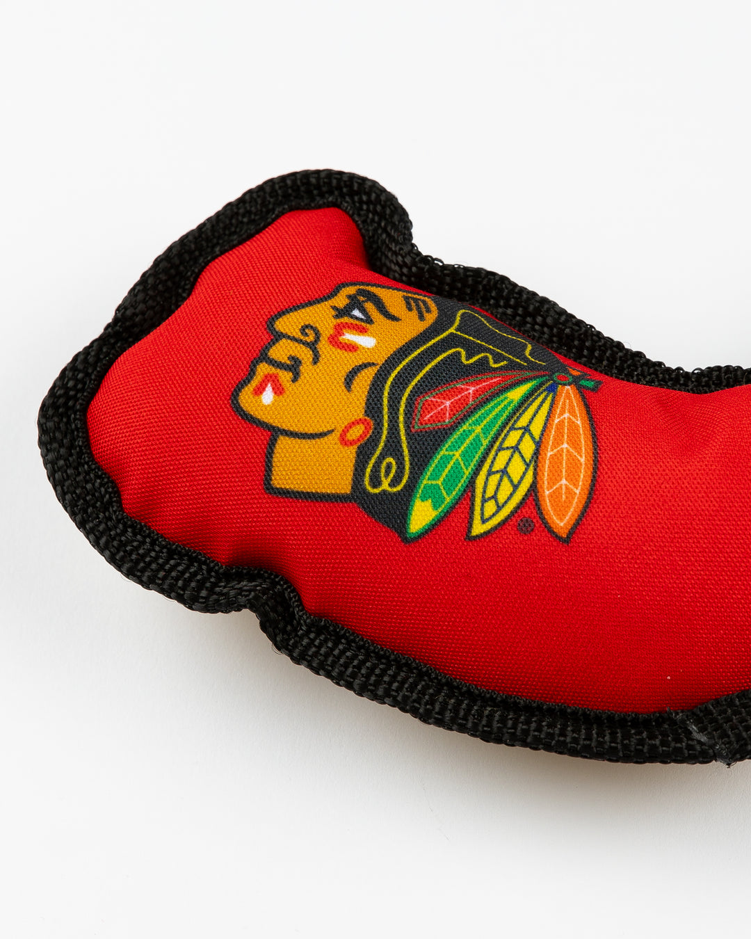 Chicago Blackhawks dog toy in shape of hockey stick - alt detail lay flat
