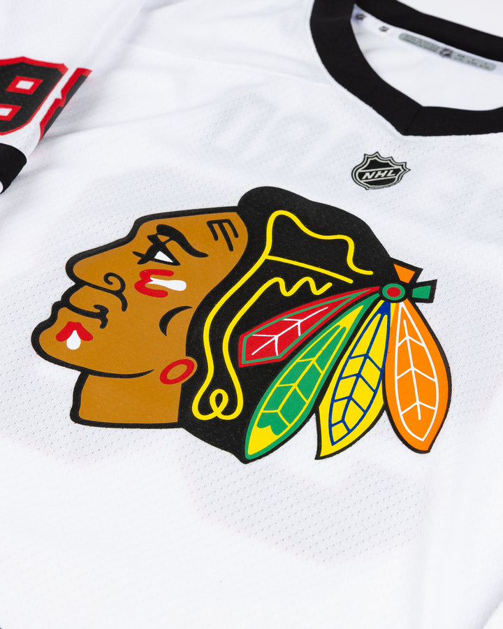 white away Chicago Blackhawks Connor Bedard youth replica jersey - detail front lay flat