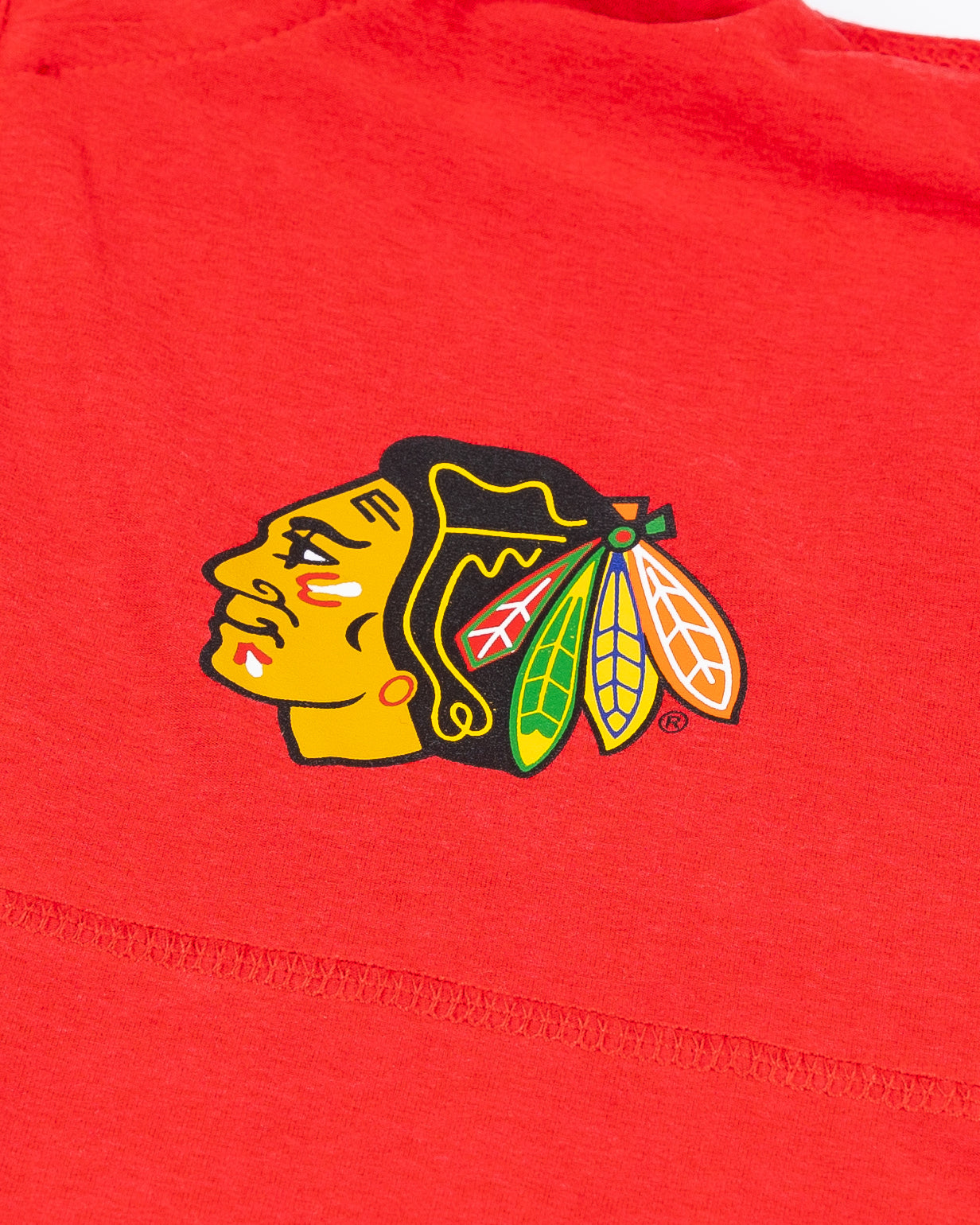 red Colosseum quarter zip with Chicago Blackhawks primary logo on left chest - detail lay flat
