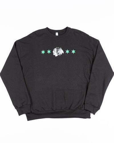 black crewneck with Chicago Blackhawks primary logo and four stars inspired design for St. Patrick's Day - front lay flat