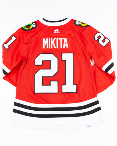 red adidas Chicago Blackhawks jersey with Stan Mikita name and number stitched - back lay flat