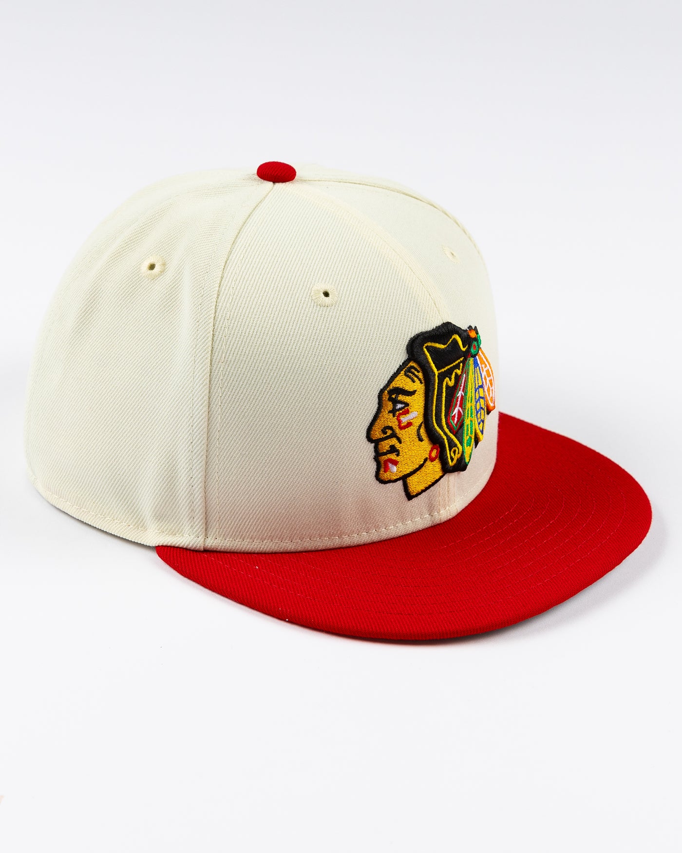 cream and red two tone fitted New Era 59FIFTY cap with embroidered Chicago Blackhawks primary logo on front - right angle lay flat