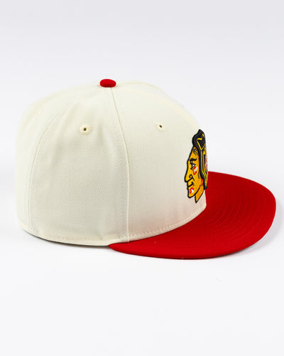 cream and red two tone fitted New Era 59FIFTY cap with embroidered Chicago Blackhawks primary logo on front - right side lay flat