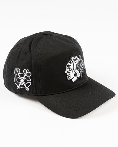 '47 black adjustable snapback cap with tonal Chicago Blackhawks primary logo embroidered on front and secondary logo embroidered on right side - right angle lay flat