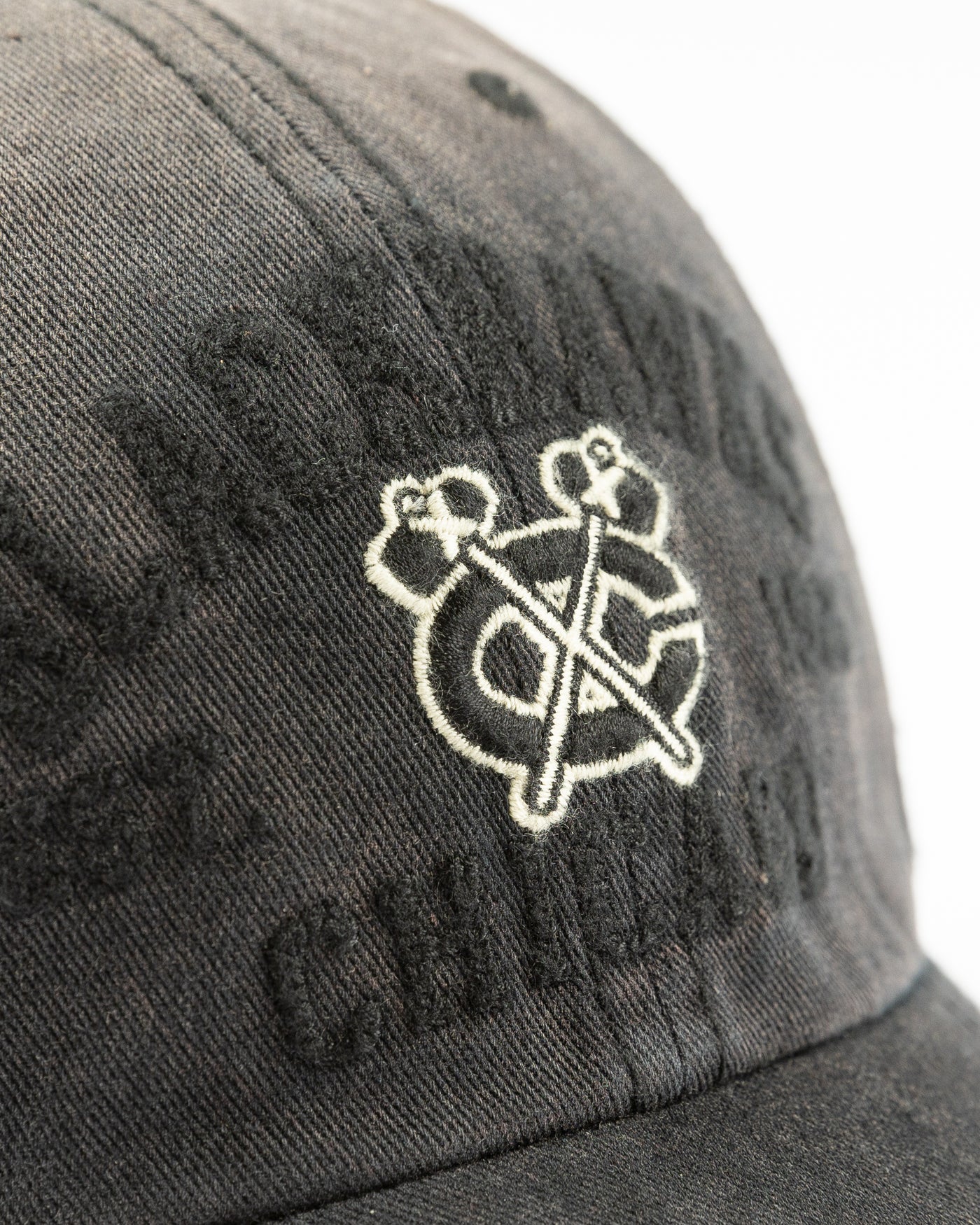 '47 brand washed black adjustable cap with Chicago Blackhawks wordmark and secondary logo embroidered on front - detail lay flat