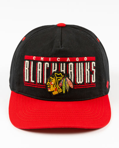 black and red '47 brand snapback hat with Chicago Blackhawks wordmark and primary logo embroidered on the front - front lay flat